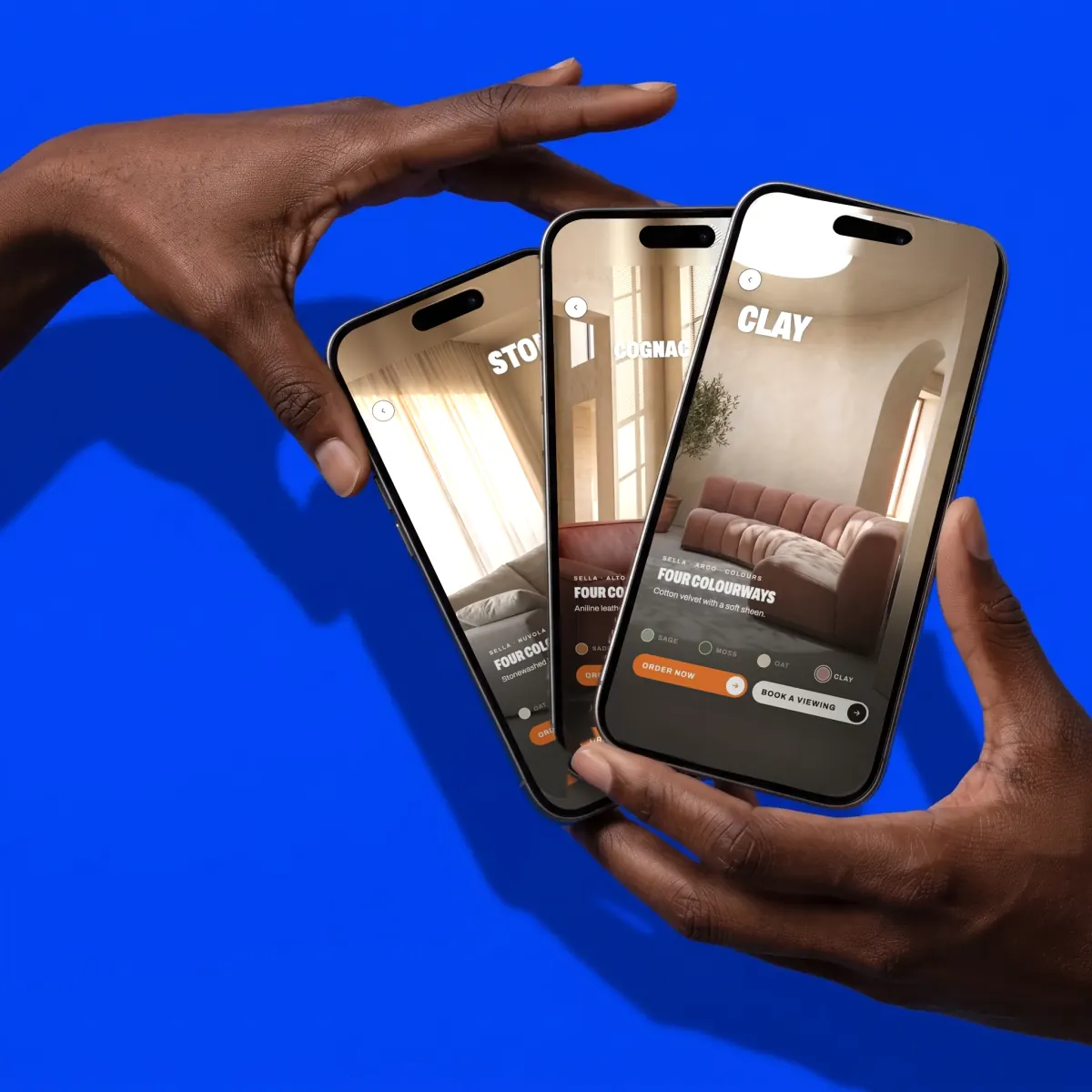 Three phones fanned in a hand on a blue backdrop, each showing a different sofa colour from one shoppable activation