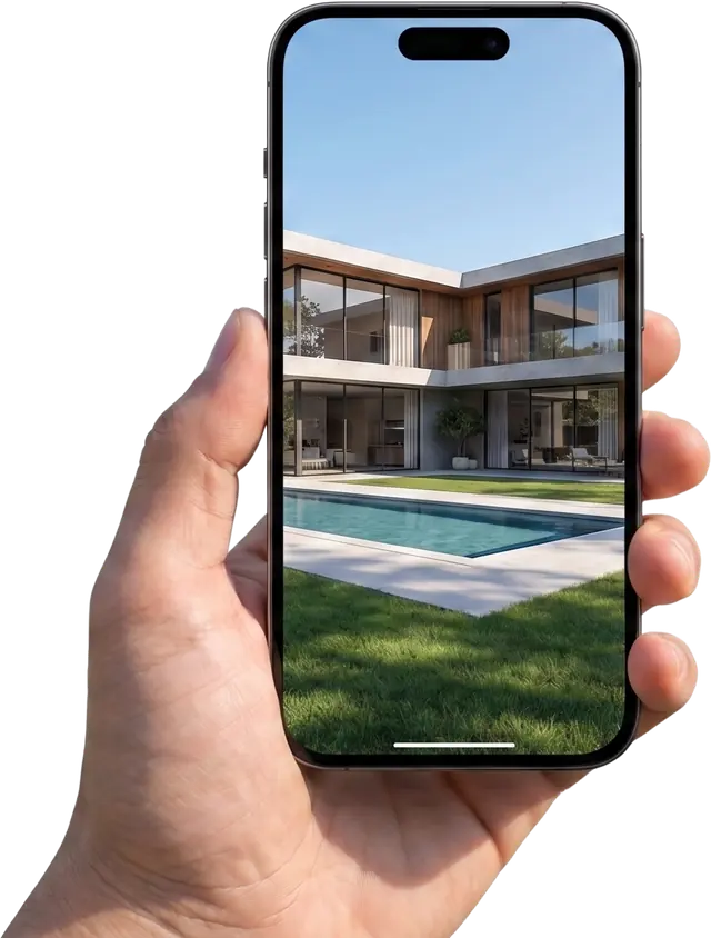 A hand holds a phone showing the villa up close, ready to tour.